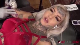 Amber Luke masturbates while getting tattooed